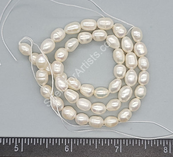 Pure White Baroque Oval Shape Genuine Cultured Pearls